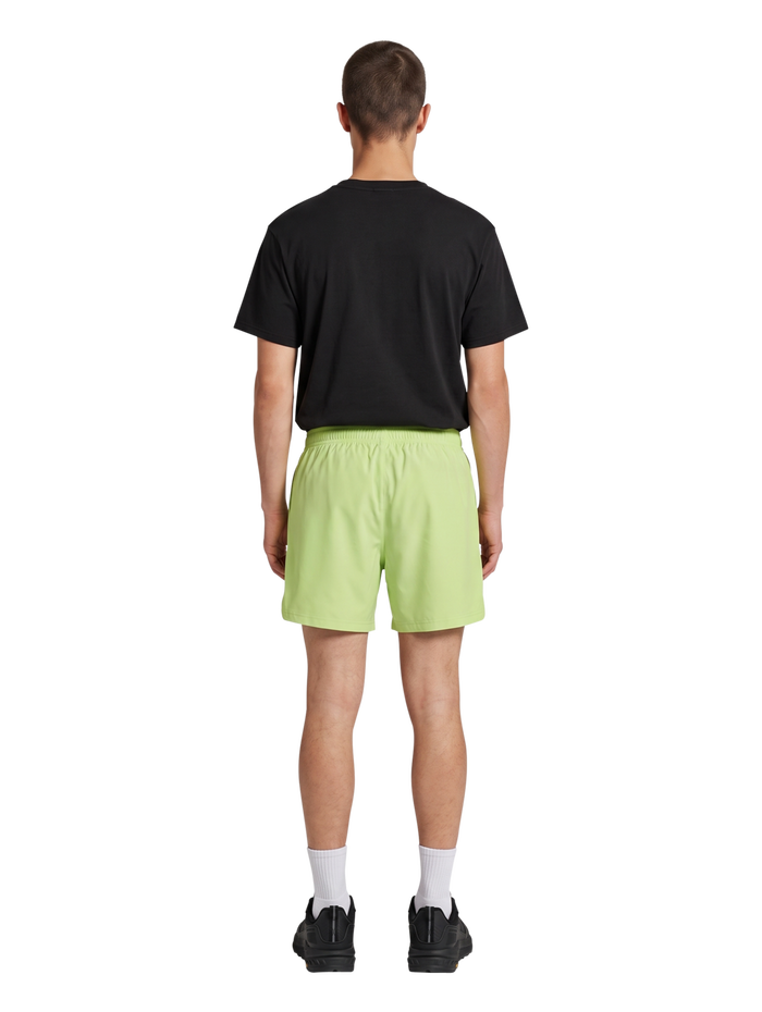 HALO SHORTS, SHADOW LIME, model